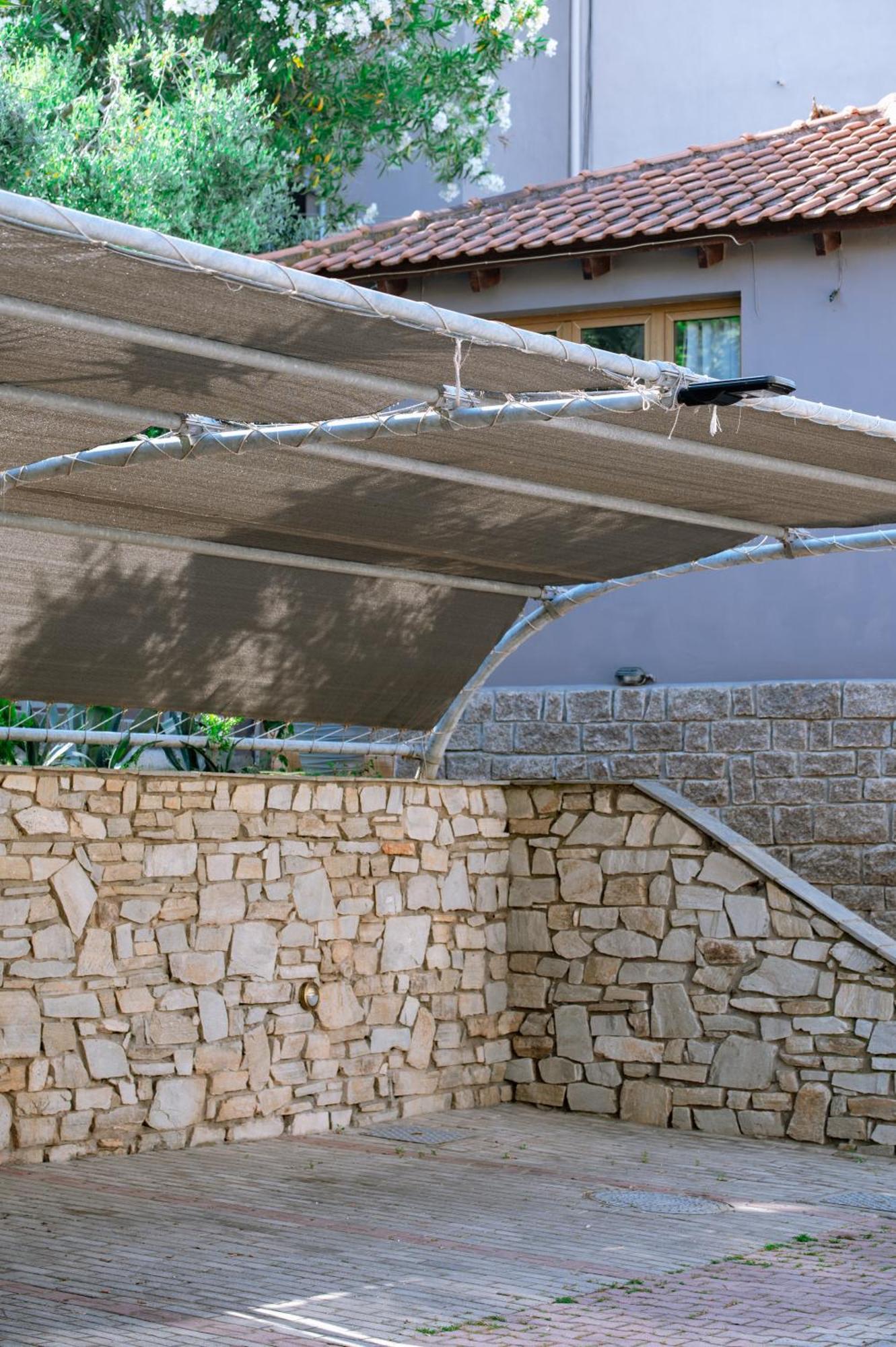 Ktima Papaoikonomou Apartment Potos Bagian luar foto